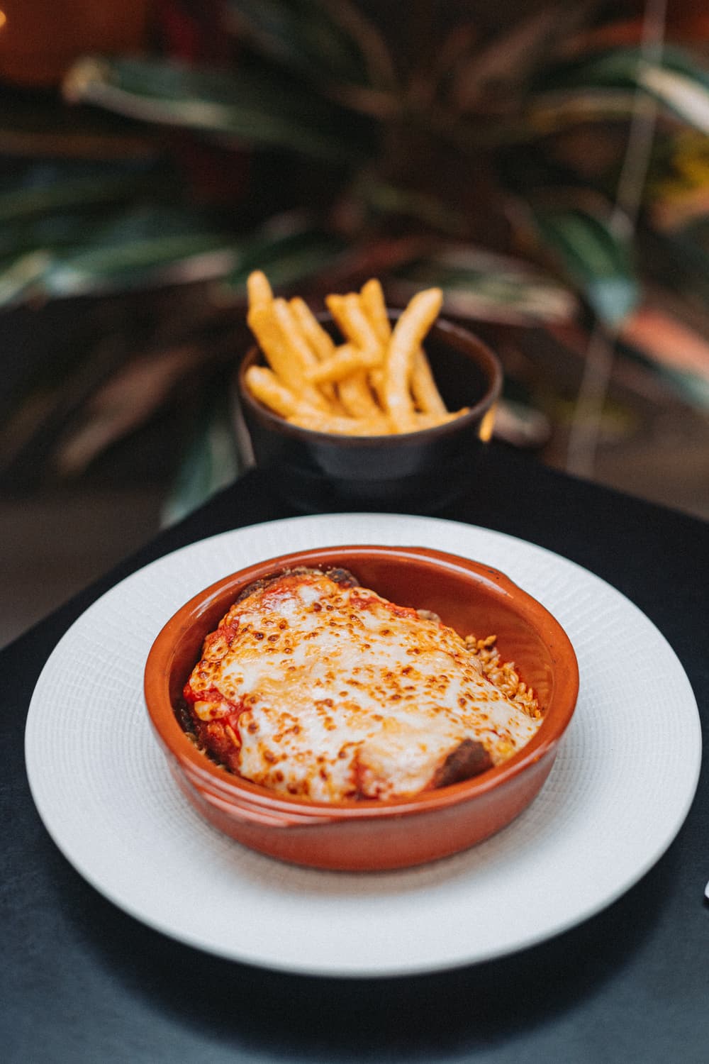Milanesa de pollo a la parmigiana